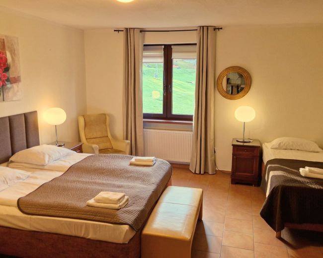Pokoje i Apartamenty